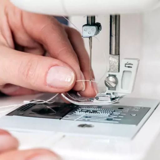 How do you properly thread the Singer Sewing Machine